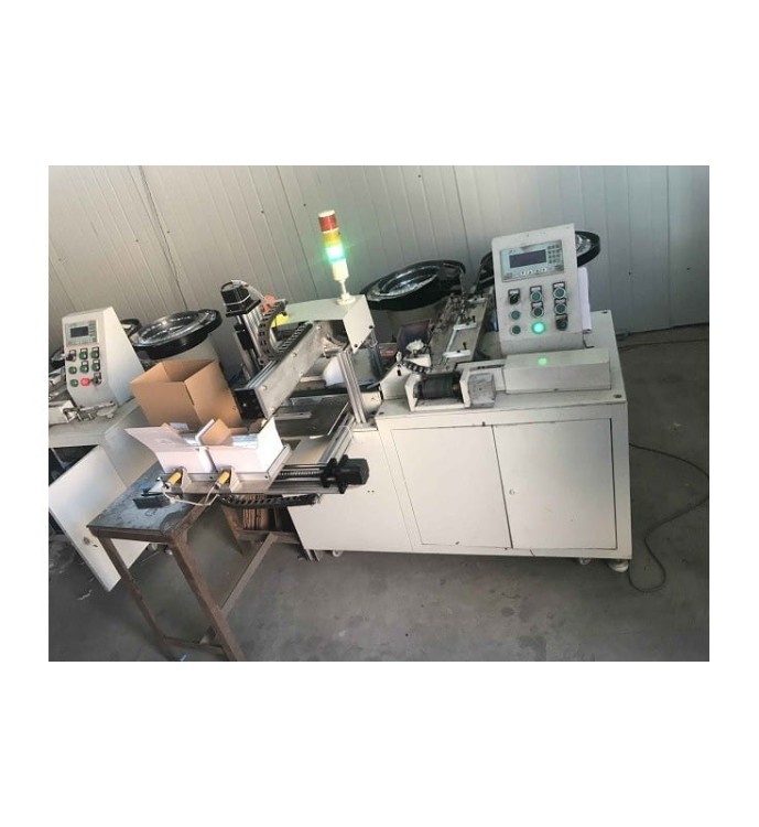 MASZYNA DO NAKLEJANIA ODWAŻNIKÓW NA TAŚMĘ  XST-C1100NT