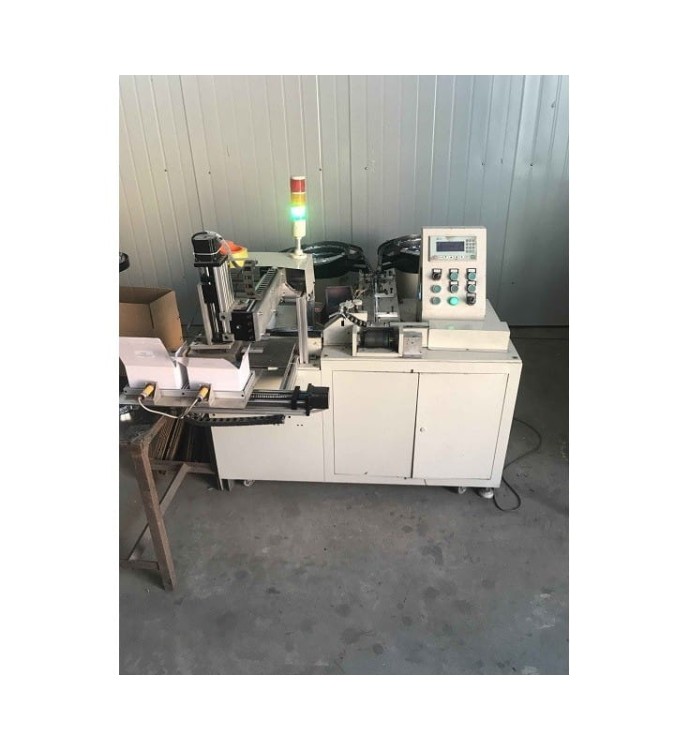 MASZYNA DO NAKLEJANIA ODWAŻNIKÓW NA TAŚMĘ  XST-C1100NT