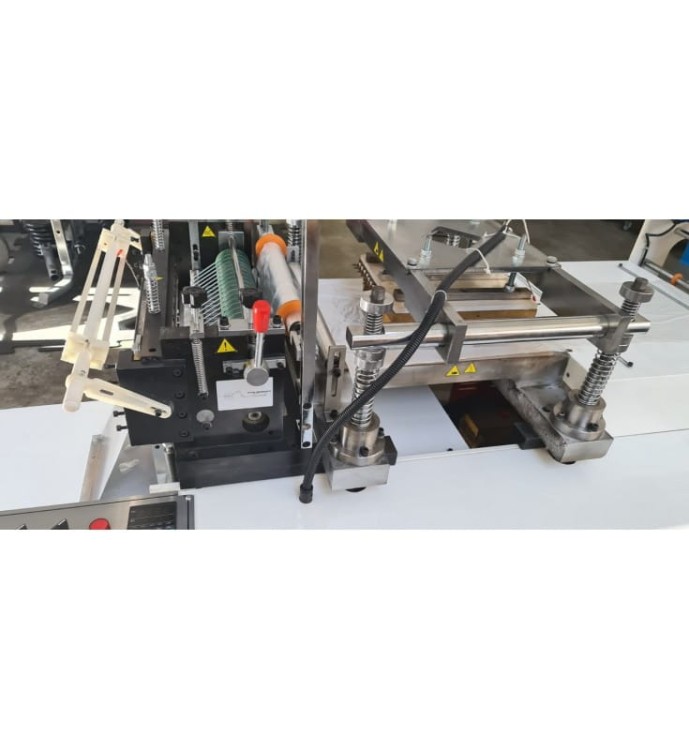 MASZYNA DO PRODUKCJI RĘKAWICZEK FOLIOWYCH