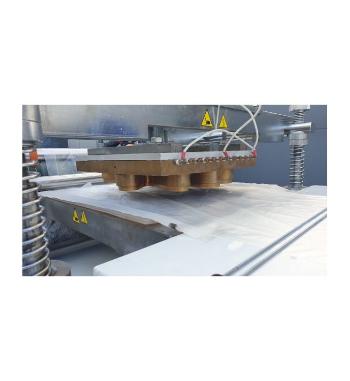 MASZYNA DO PRODUKCJI RĘKAWICZEK FOLIOWYCH